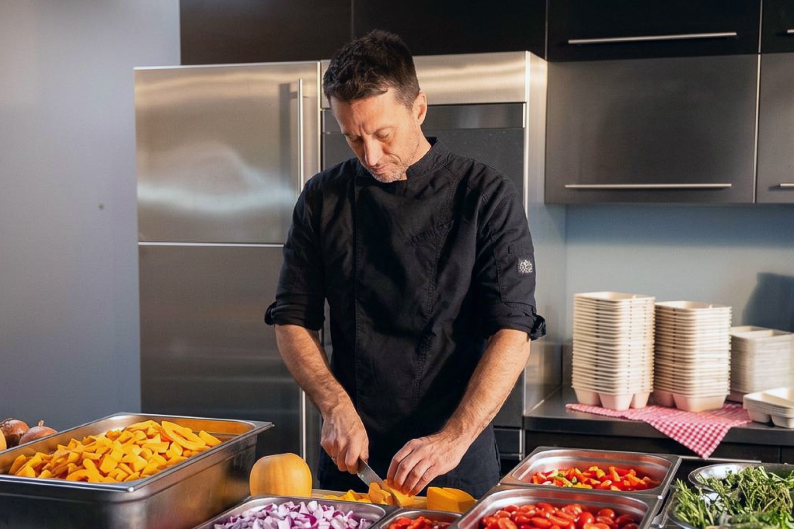 Head chef Stefan prepares freshly cooked Tom Tasty meals